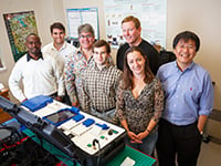 The team behind the NESDEP IU Molecular Diagnostic System. Left to right; Charles Sefuku, Dan Kocen, F Cubed founder and CEO Les Ivie, Chris Chanelli, Bob Williams, Shaunasee Kocen and Professor Chia Chang
