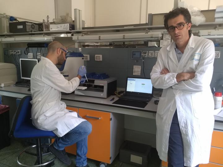 Andrea Gherli (left) and Giovanni Roti are using the D300e to screen small molecule drugs for AML